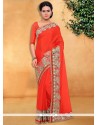 Fashionable Faux Chiffon Orange Patch Border Work Designer Saree