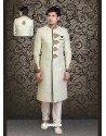 Scintillating Cream Churidar Sherwani