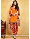 Outstanding Print Work Orange Fancy Fabric Punjabi Suit