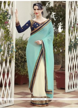 Pretty Cream And Turquoise Patch Border Work Faux Georgette Half N Half Saree