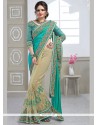 Gripping Net Beige And Sea Green Half N Half Trendy Saree