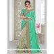 Opulent Patch Border Work Beige And Sea Green Designer Half N Half Saree