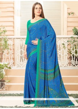 Engrossing Blue Faux Crepe Printed Saree