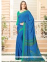 Engrossing Blue Faux Crepe Printed Saree