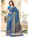 Spectacular Faux Crepe Blue Printed Saree