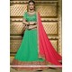 Deserving Net Sea Green Lehenga Choli