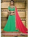 Deserving Net Sea Green Lehenga Choli