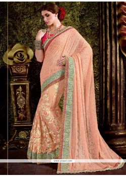 Imposing Net Peach Classic Designer Saree