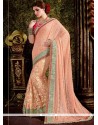 Imposing Net Peach Classic Designer Saree