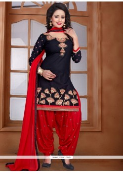 Grandiose Lace Work Black And Red Punjabi Suit