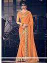 Nice Fancy Fabric Orange Classic Saree