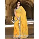 Savory Faux Georgette Yellow Stone Work Classic Saree