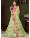 Gripping Embroidered Work Green Art Silk Lehenga Choli