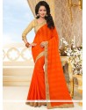 Prodigious Orange Designer Saree