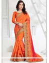 Whimsical Orange Zari Work Traditional Designer Saree