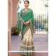Compelling Fancy Fabric Cream And Green Patch Border Work Designer Bridal Sarees