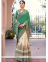 Compelling Fancy Fabric Cream And Green Patch Border Work Designer Bridal Sarees