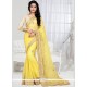 Whimsical Yellow Patch Border Work Shimmer Georgette Designer Saree