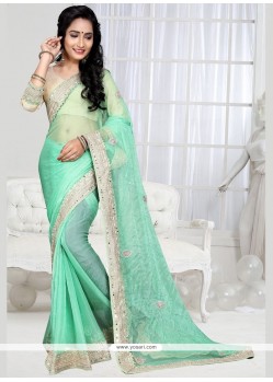 Embroidered Shimmer Georgette Designer Saree In Sea Green