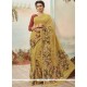 Dilettante Art Silk Yellow Casual Saree