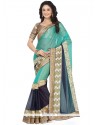 Immaculate Navy Blue And Sea Green Patch Border Work Lycra Saree