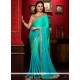 Riveting Faux Georgette Embroidered Work Classic Designer Saree