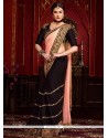 Radiant Faux Chiffon Black And Peach Designer Half N Half Saree