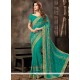 Adorable Sea Green Patch Border Work Faux Georgette Designer Saree