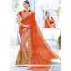Deserving Net Beige And Orange Patch Border Work Half N Half Designer Saree