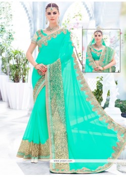Miraculous Embroidered Work Turquoise Faux Georgette Classic Designer Saree