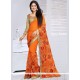 Beckoning Orange Lace Work Classic Designer Saree
