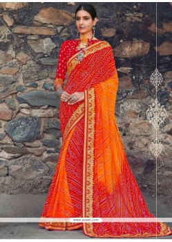 Sparkling Faux Georgette Orange And Red Print Work Shaded Saree