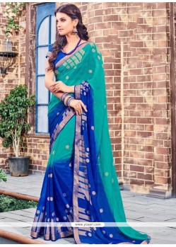 Capricious Blue And Sea Green Print Work Brasso Shaded Saree