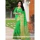 Topnotch Banarasi Silk Green Woven Work Traditional Designer Saree