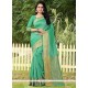 Catchy Woven Work Sea Green Traditional Designer Saree