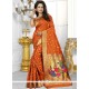 Riveting Weaving Work Orange Traditional Saree