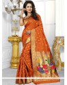 Riveting Weaving Work Orange Traditional Saree