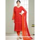 Flattering Orange Embroidered Work Churidar Suit