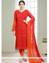 Flattering Orange Embroidered Work Churidar Suit