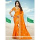 Hypnotic Patch Border Work Orange Saree