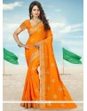 Hypnotic Patch Border Work Orange Saree