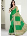 Titillating Green Patch Border Work Faux Georgette Classic Saree
