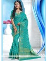 Resplendent Art Silk Sea Green Designer Traditional Saree