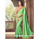 Tantalizing Art Silk Sea Green Traditional Saree