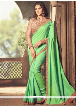 Tantalizing Art Silk Sea Green Traditional Saree