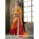 Alluring Orange And Red Patch Border Work Faux Chiffon Shaded Saree