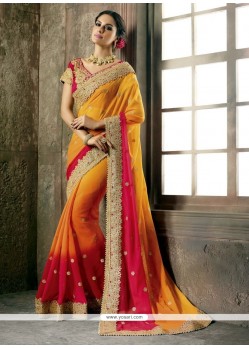 Alluring Orange And Red Patch Border Work Faux Chiffon Shaded Saree