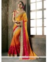 Alluring Orange And Red Patch Border Work Faux Chiffon Shaded Saree