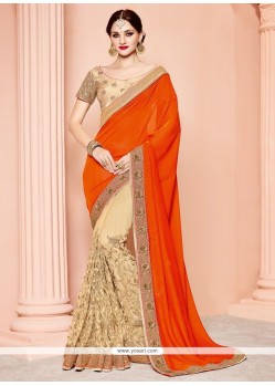 Stunning Beige And Orange Embroidered Work Net Designer Half N Half Saree