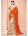 Stunning Beige And Orange Embroidered Work Net Designer Half N Half Saree